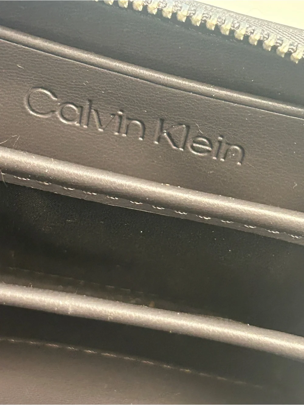 Calvin Klein gray pebbled leather zip wallet